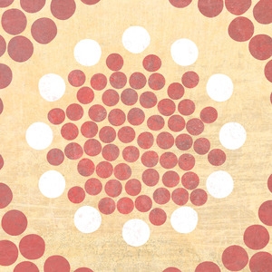 A number of small red circles in a circle, surrounded by larger white circles in a circle, with larger red circles in the outskirts beyond.