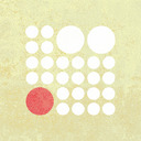 A red circle at bottom left; two white circles at top right; smaller circles in a grid in the spaces between.