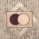 A dark circle at left under a lighter circle at right.