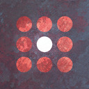 A white circle at the center of a 9x9 square of red circles.