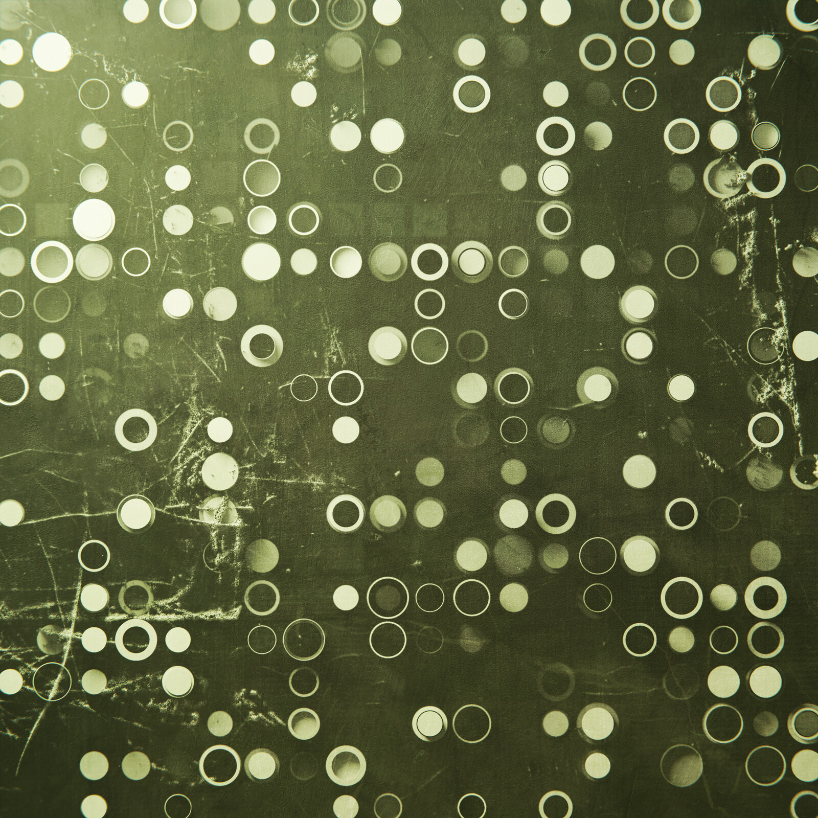 A grid of circles in a greenish light.